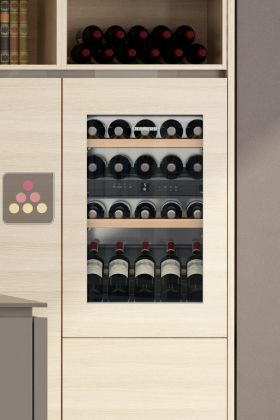 Cave à vin multi-usages de conservation et de service des vins intégrable à façade habillable