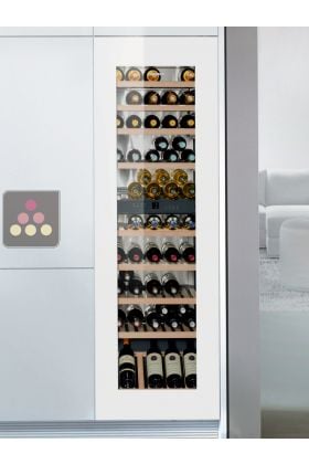 Cave à vin multi-usages de conservation et de service des vins encastrable a porte en verre blanche
