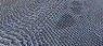 Le panneau intérieur est habillé d'éco-cuir Reptile bleu (simili-cuir à faible impact environnemental)